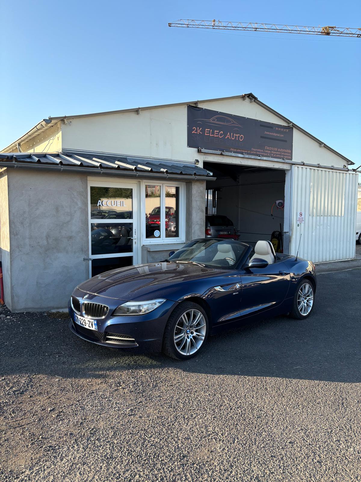 photo bmw devant garage